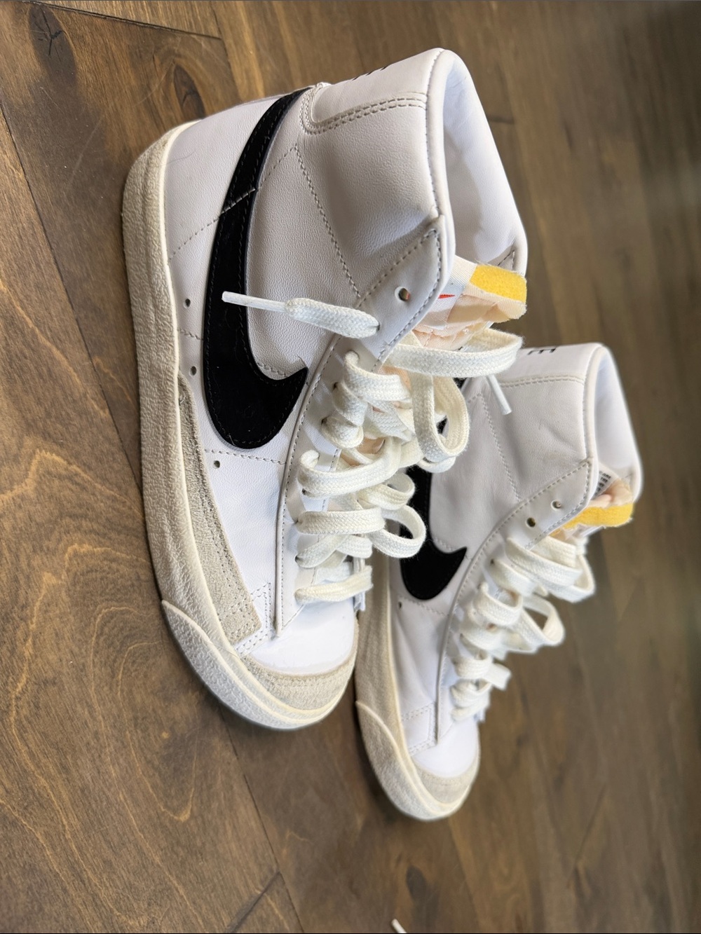 Nike White High-Top Sneakers with Black Swoosh and Cream Accents
